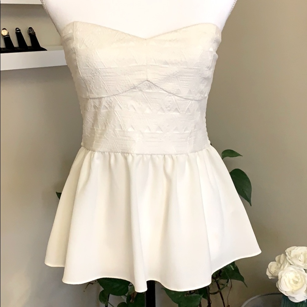 Classy Cream Sleeveless Peplum